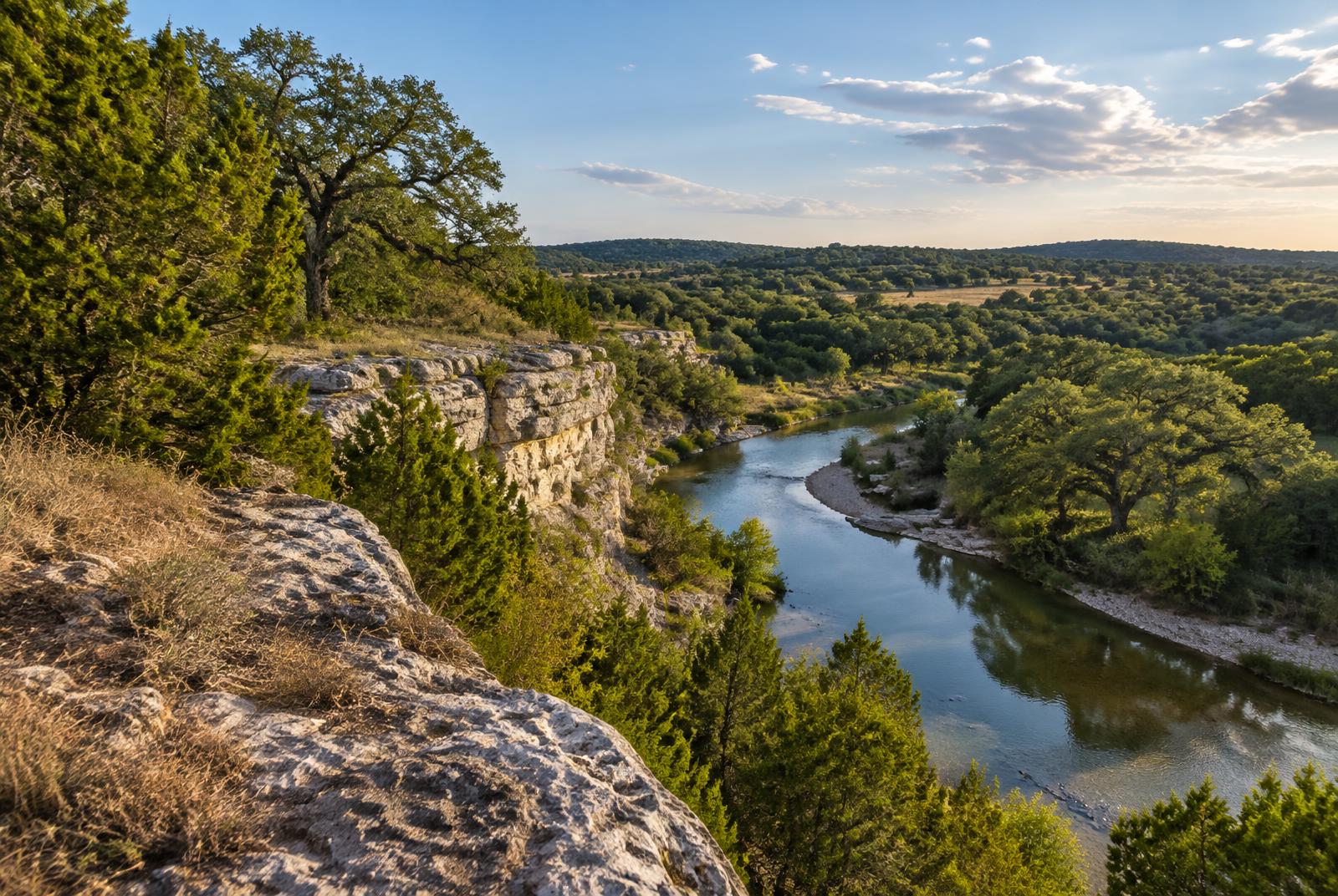 Limestone bluff above a winding Texas creek